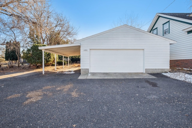 garage with a carport