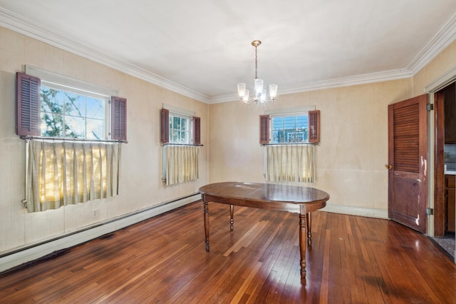 dining area featuring a chandelier, wood-type flooring, a wealth of natural light, and a baseboard heating unit