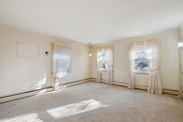 carpeted empty room featuring crown molding