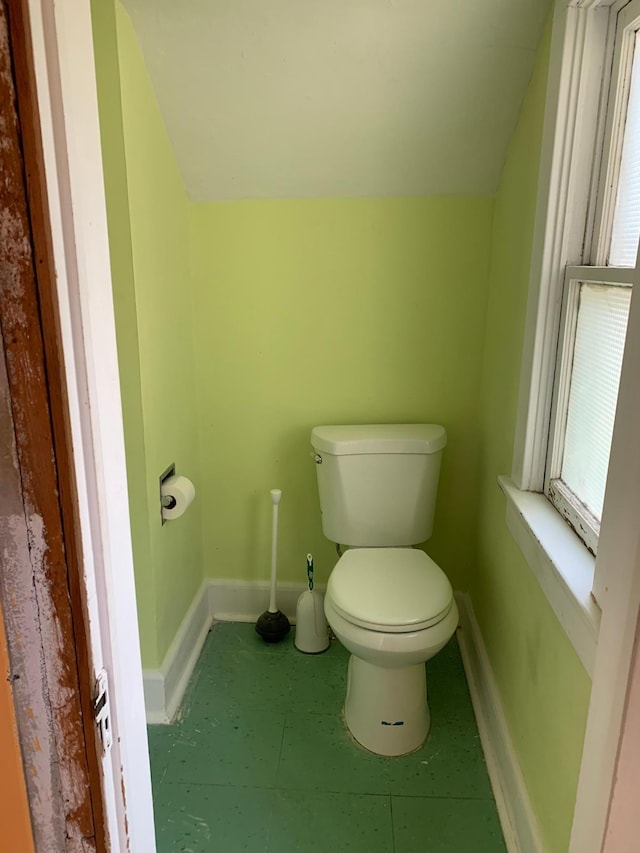 bathroom featuring toilet