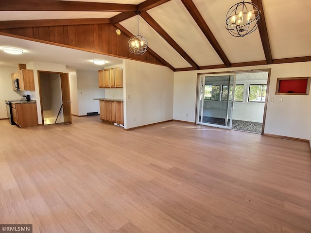 unfurnished living room with beam ceiling, a chandelier, and light wood-type flooring