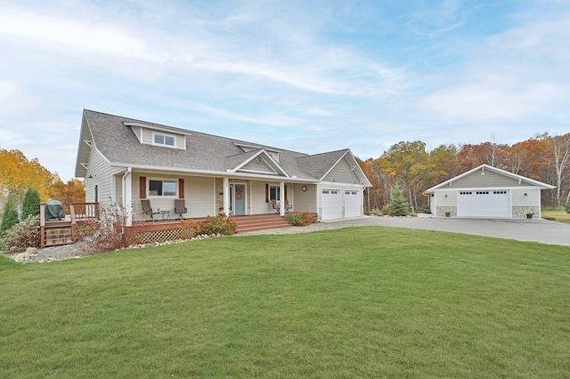 view of front of home with covered porch and a front lawn