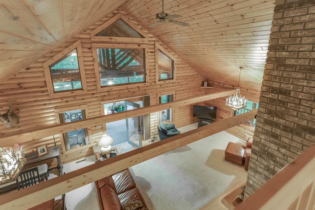 living room featuring wood ceiling, high vaulted ceiling, and ceiling fan with notable chandelier