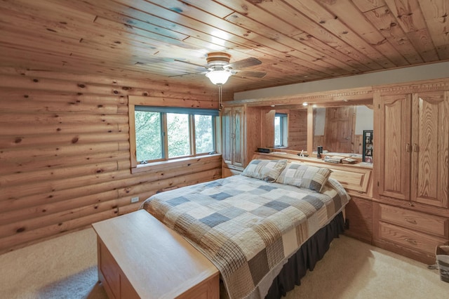 bedroom with light carpet, wood ceiling, rustic walls, and ceiling fan