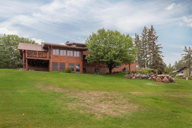 view of yard featuring a wooden deck