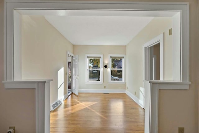 foyer with light wood-type flooring