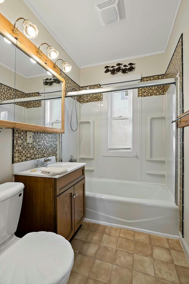 full bathroom with tasteful backsplash, toilet, shower / bath combination, vanity, and crown molding