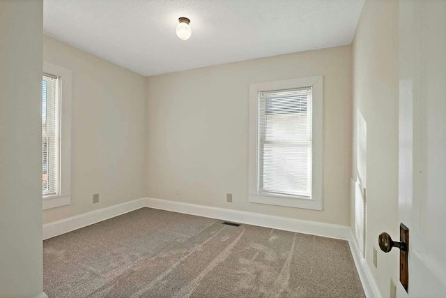 view of carpeted spare room