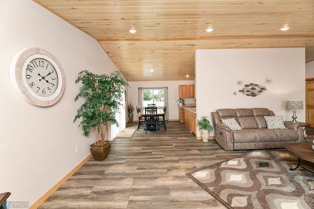 living room featuring vaulted ceiling, hardwood / wood-style flooring, and wood ceiling