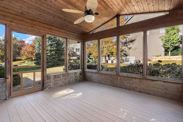 unfurnished sunroom featuring wood ceiling, lofted ceiling, and ceiling fan