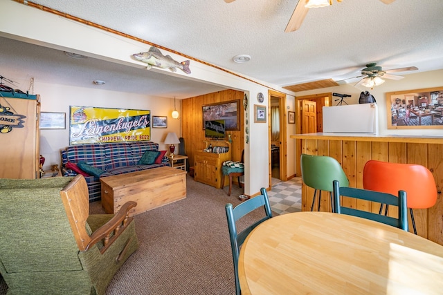 34779 County Road 39, Pequot Lakes, MN 56472 - dining space featuring a ceiling fan, a textured ceiling, and carpet floors