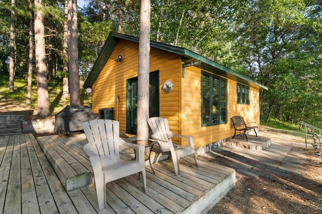 34779 County Road 39, Pequot Lakes, MN 56472 - wooden deck featuring view of scattered trees
