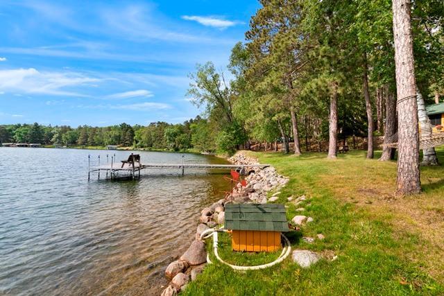 34779 County Road 39, Pequot Lakes, MN 56472 - dock featuring a water view and a forest view
