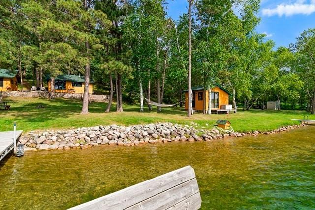34779 County Road 39, Pequot Lakes, MN 56472 - dock featuring a water view and a yard