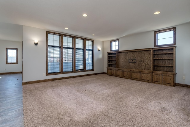 unfurnished living room with carpet floors