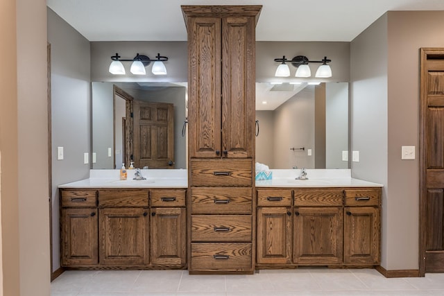 bathroom with vanity and tile patterned floors