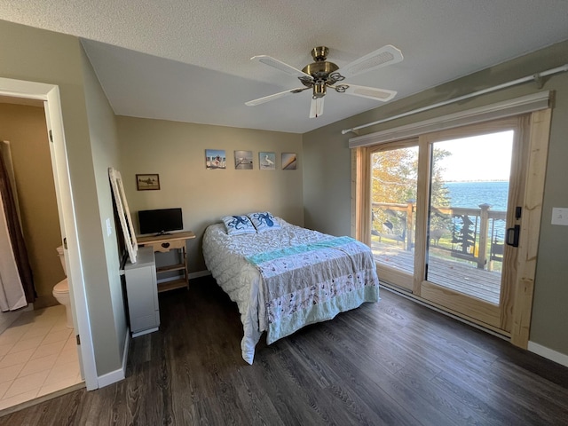 8291 Boy Lake Dr NE, Remer, MN 56672 - bedroom featuring access to outside, wood finished floors, baseboards, and a ceiling fan