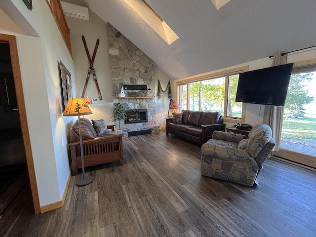 8291 Boy Lake Dr NE, Remer, MN 56672 - living area featuring a skylight, a stone fireplace, wood finished floors, plenty of natural light, and a textured ceiling