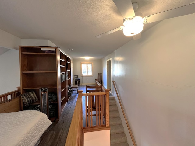8291 Boy Lake Dr NE, Remer, MN 56672 - bedroom featuring dark wood-style flooring, baseboards, and ceiling fan