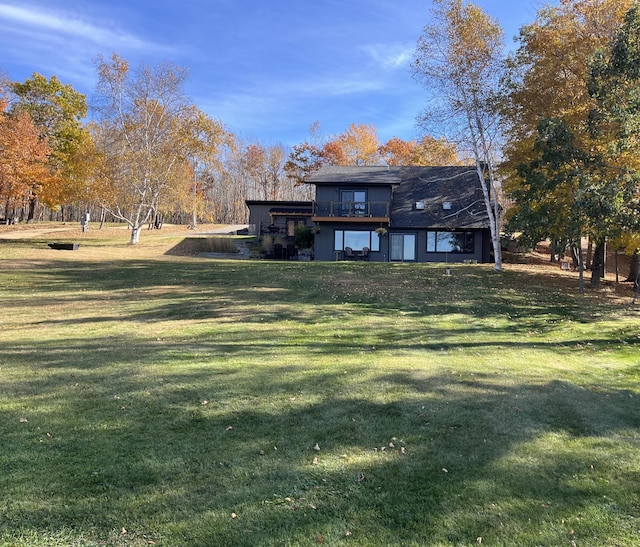 8291 Boy Lake Dr NE, Remer, MN 56672 - rear view of house with a lawn