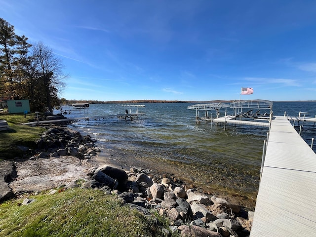 8291 Boy Lake Dr NE, Remer, MN 56672 - dock featuring a water view and boat lift