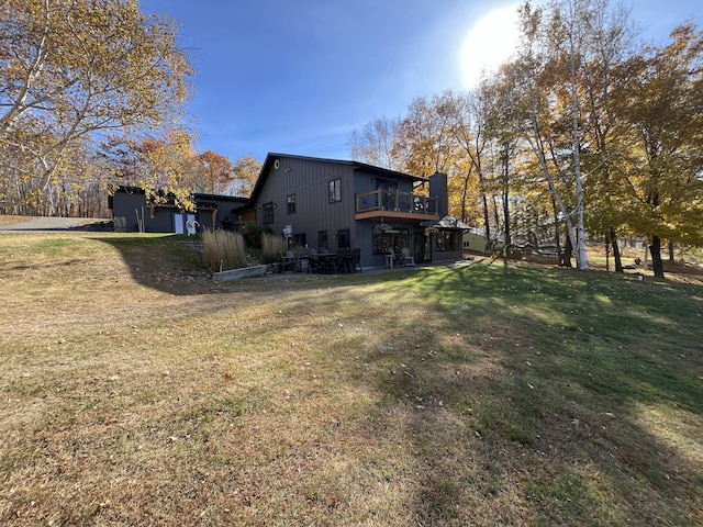 8291 Boy Lake Dr NE, Remer, MN 56672 - rear view of property with a yard