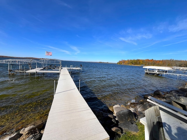 8291 Boy Lake Dr NE, Remer, MN 56672 - dock area with a water view and boat lift