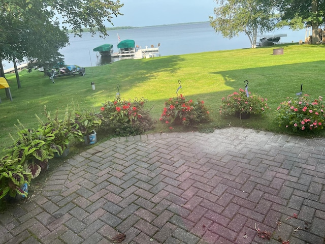 8291 Boy Lake Dr NE, Remer, MN 56672 - view of patio featuring a water view