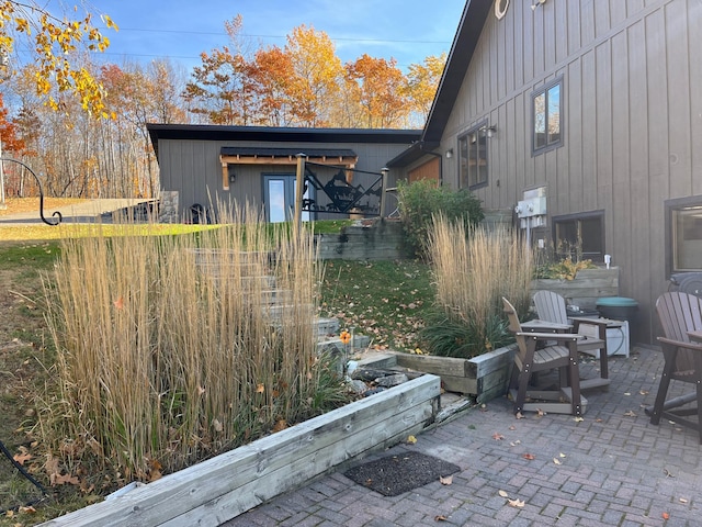 8291 Boy Lake Dr NE, Remer, MN 56672 - view of home's exterior with a patio