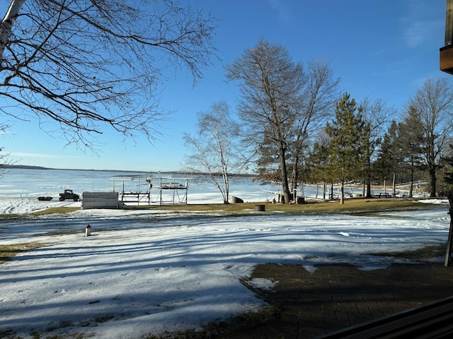 8291 Boy Lake Dr NE, Remer, MN 56672 - yard layered in snow with a water view
