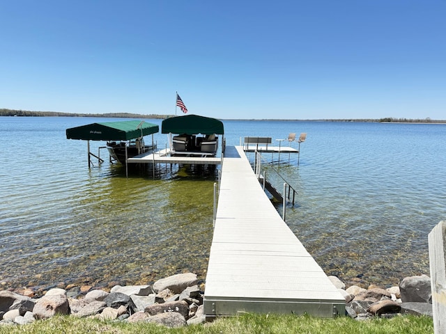 8291 Boy Lake Dr NE, Remer, MN 56672 - dock area with a water view and boat lift
