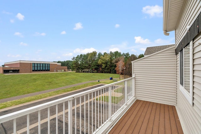 wooden deck with a yard