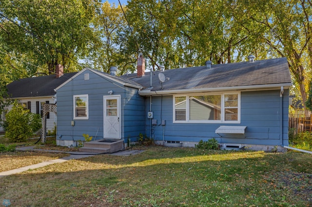 view of front of home with a front yard