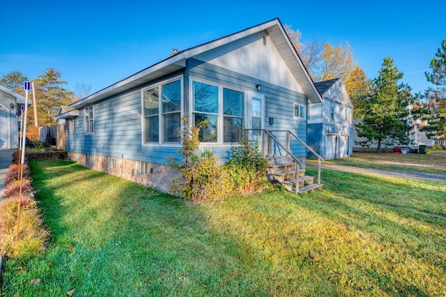 view of property exterior featuring a yard