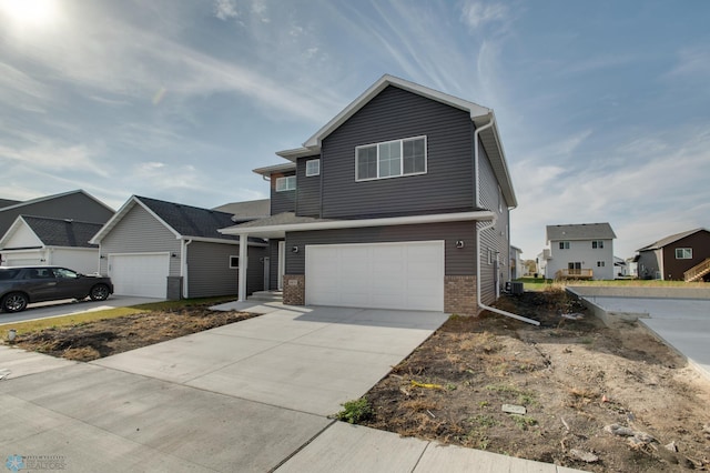 front facade with a garage