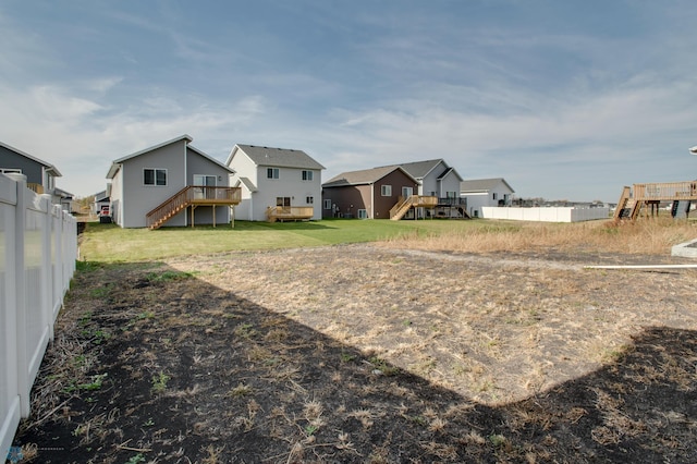 view of yard featuring a wooden deck