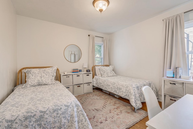 bedroom with light hardwood / wood-style flooring