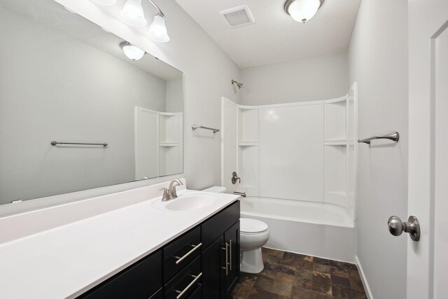 full bathroom with toilet, vanity, and shower / bathtub combination