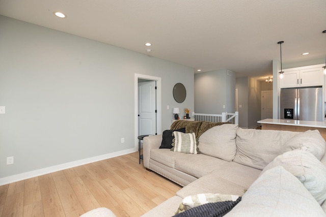 living room with light hardwood / wood-style floors