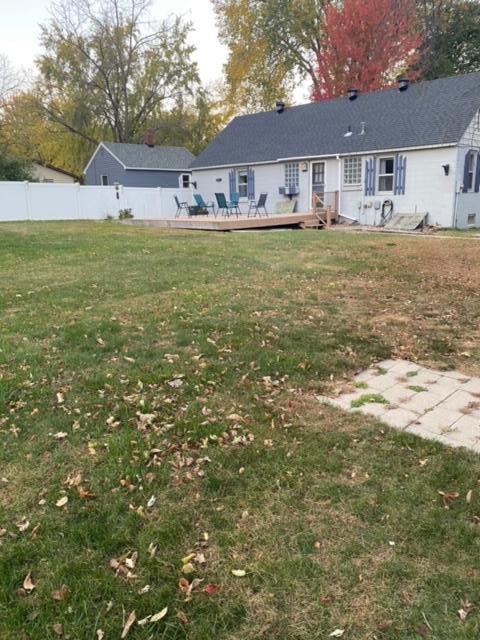 view of yard with a wooden deck