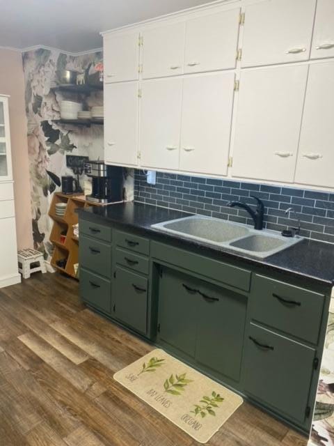 kitchen with white cabinetry and dark wood-type flooring