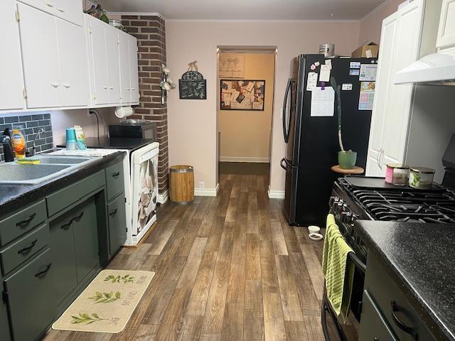 kitchen featuring dark hardwood / wood-style flooring, white cabinets, black appliances, and custom exhaust hood