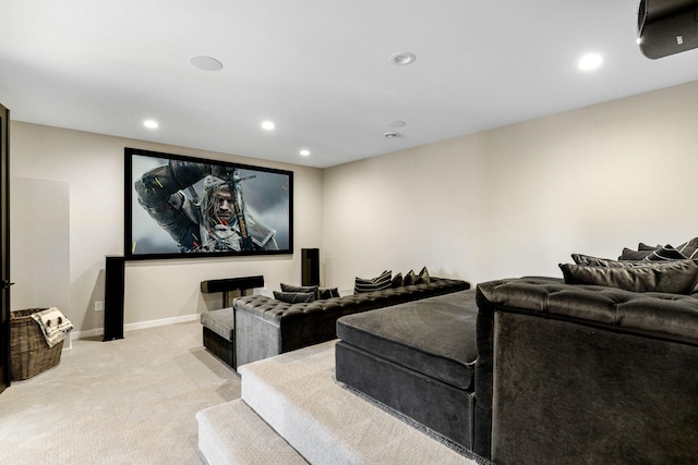 home theater room featuring light carpet