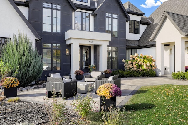 exterior space with outdoor lounge area