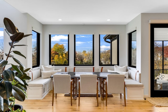 dining area featuring light wood-type flooring