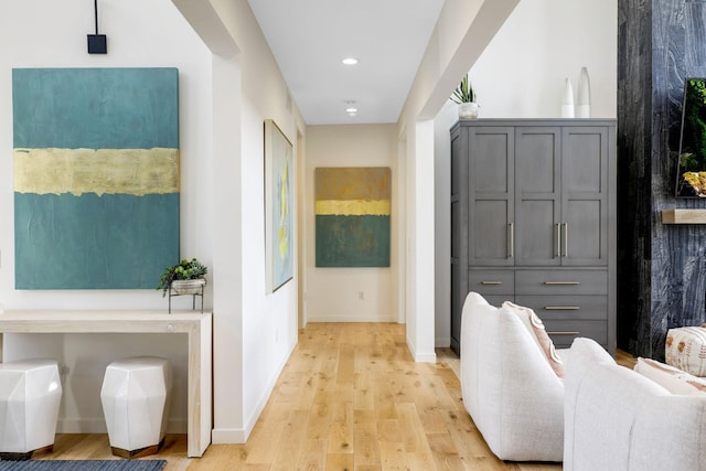 hall with light wood-type flooring