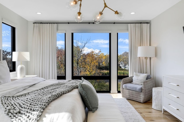 bedroom featuring light hardwood / wood-style floors