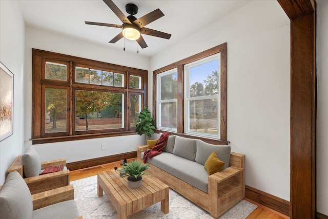 sunroom / solarium with ceiling fan