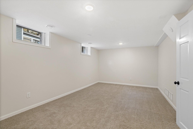 basement with light carpet