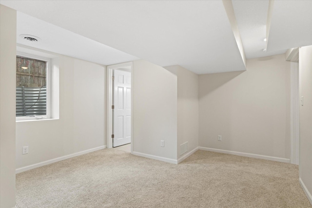 basement with light carpet